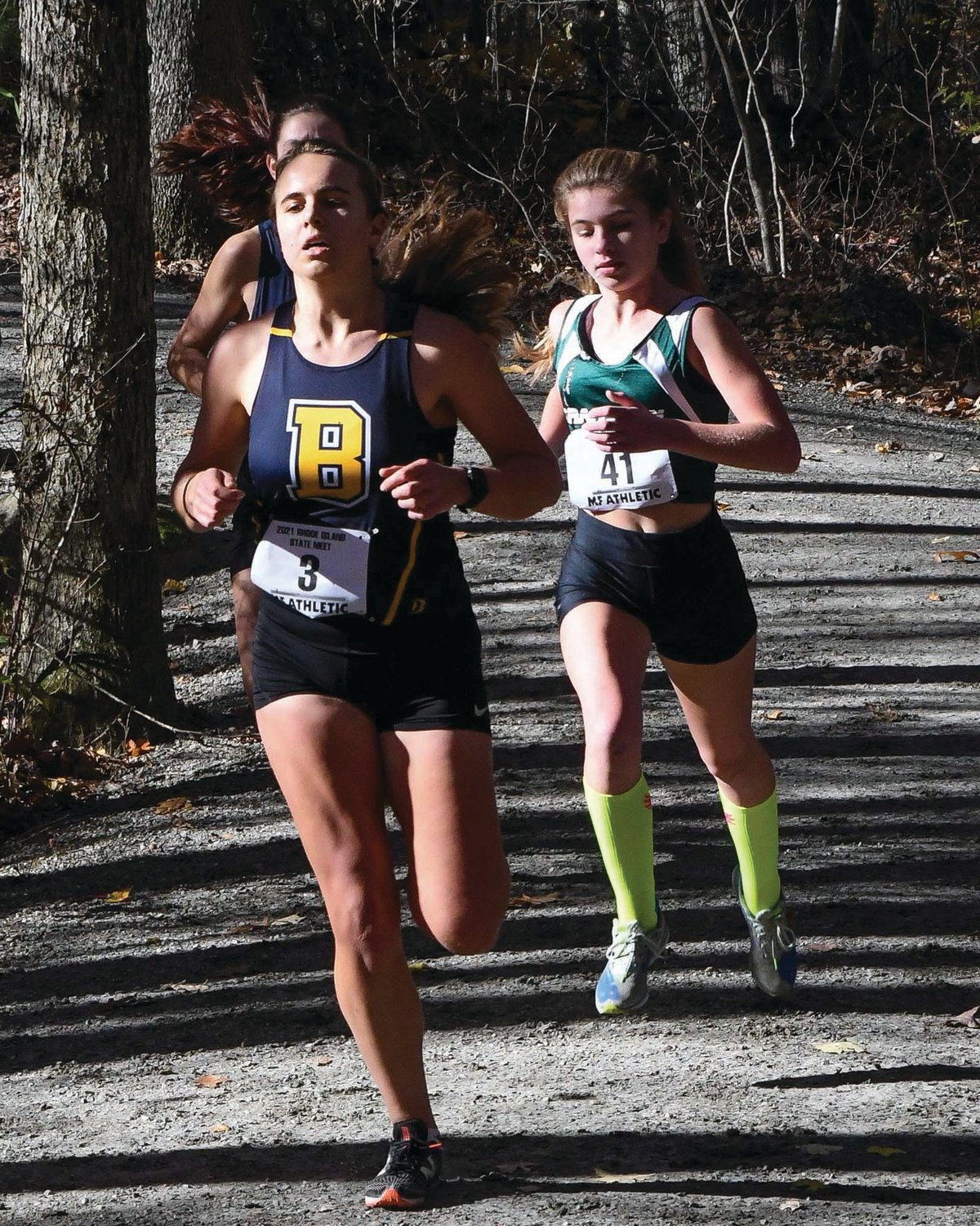 STATE MEET: Cranston
East’s Maddison Dutra
runs along the course at
Ponaganset High School
during last week’s state
championship meet. The
Lady Bolts had a solid outing,
finishing eighth place
overall.